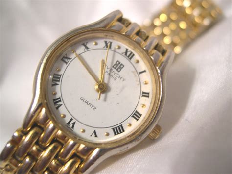 givenchy paris gold watch.